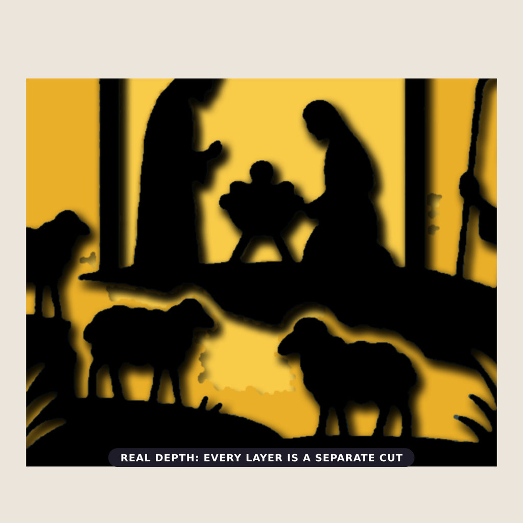 Layered nativity shadow box showing black silhouettes of Mary, Joseph and baby Jesus in a stable beneath a glowing golden Bethlehem star, with shepherds, sheep and a distant town against a blue and gold night sky.