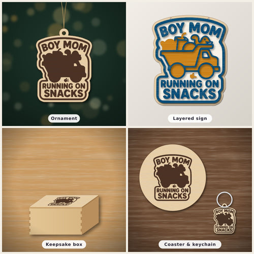 Laser cut wooden ornament engraved with the words Boy Mom Running On Snacks around a brown loaded truck silhouette, hanging on a thin cord against a blurred dark green background.