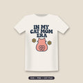 Retro wavy navy text reading In My Cat Mom Era above a pink cat seen from behind with a heart-shaped tail and two yellow flowers.