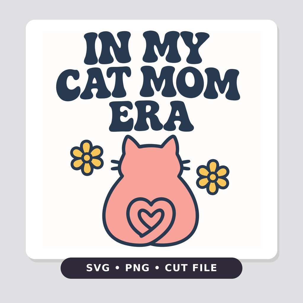 Retro wavy navy text reading In My Cat Mom Era above a pink cat seen from behind with a heart-shaped tail and two yellow flowers.