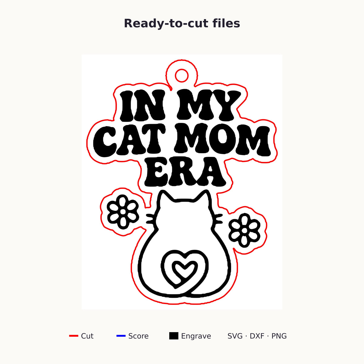 Laser cut wooden ornament engraved with the retro wavy text In My Cat Mom Era, a cat silhouette with a heart-shaped tail and two flowers, hanging on a dark green bokeh background.