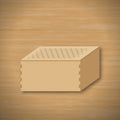 Finished light wood keepsake box with finger-jointed corners and a lid engraved with a honeycomb pattern, sitting on a wooden table.