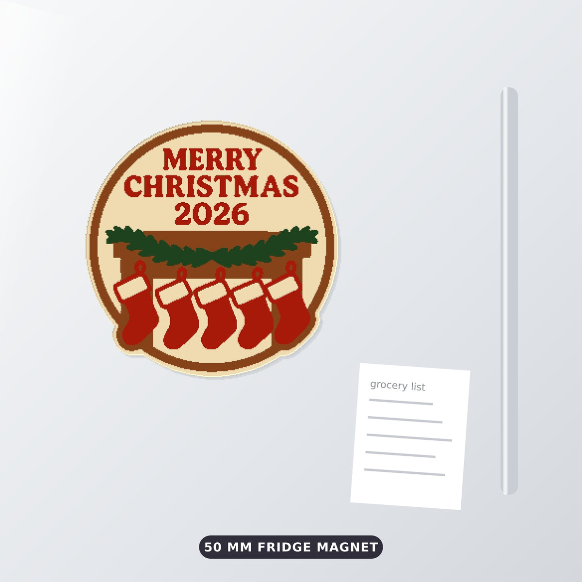 Round cream and brown Merry Christmas 2026 ornament showing five red stockings hanging from a mantel with a green garland, on a blurred dark green background with golden lights.