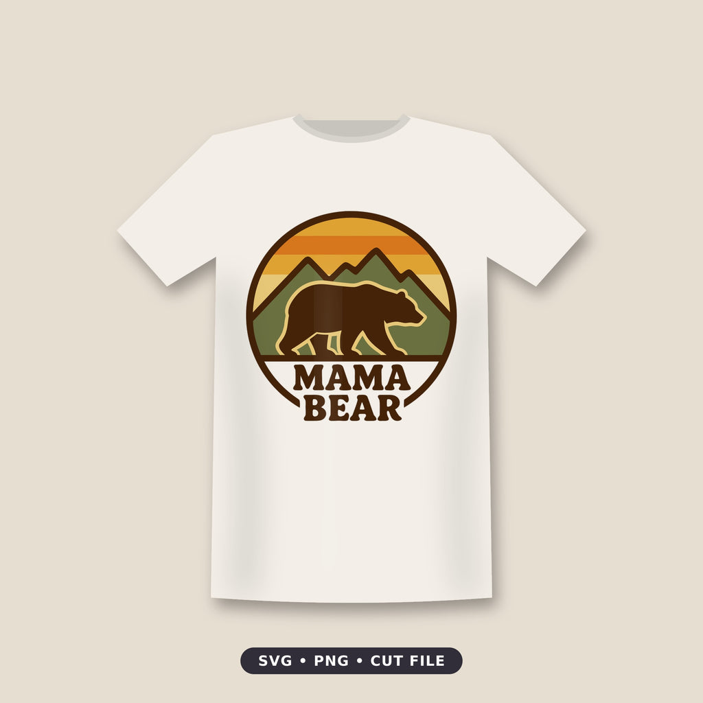 Circular retro badge of a brown bear walking in front of green mountains under an orange and yellow striped sunset, with the words Mama Bear below.