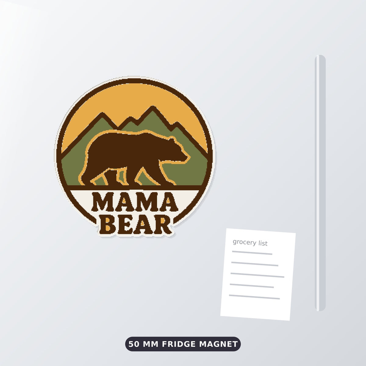Round retro mama bear ornament showing a brown bear walking in front of green mountains and a yellow sunset, with the words Mama Bear below, hanging on a gold string against a dark green background.