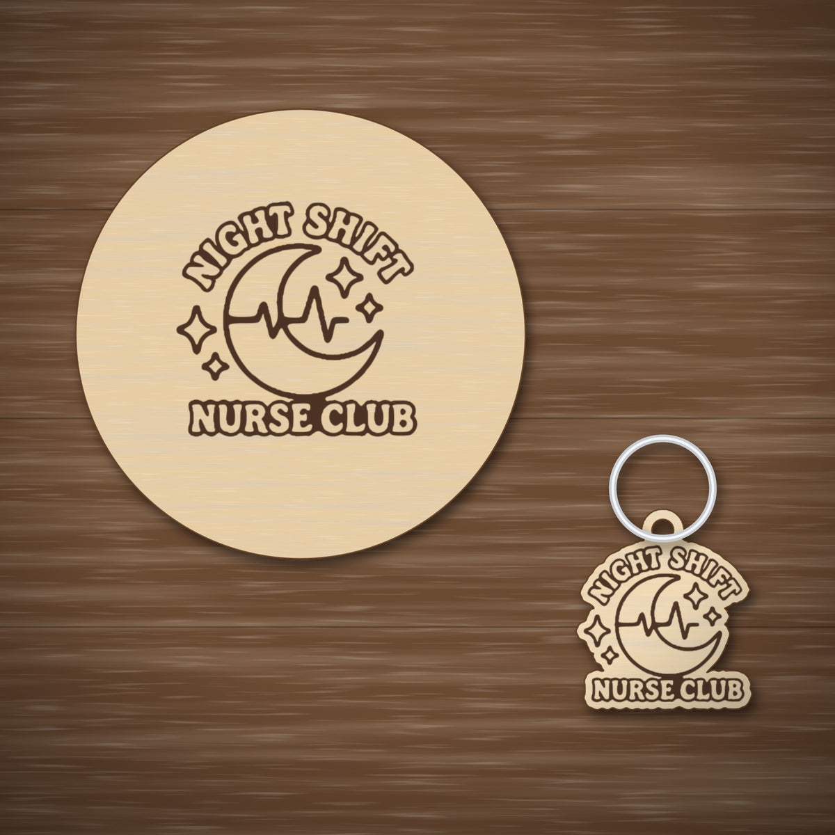 A round-cornered wooden laser cut ornament engraved with a crescent moon, heartbeat line and sparkles, with the words Night Shift Nurse Club, hanging on a gold string against a dark green background with soft lights.