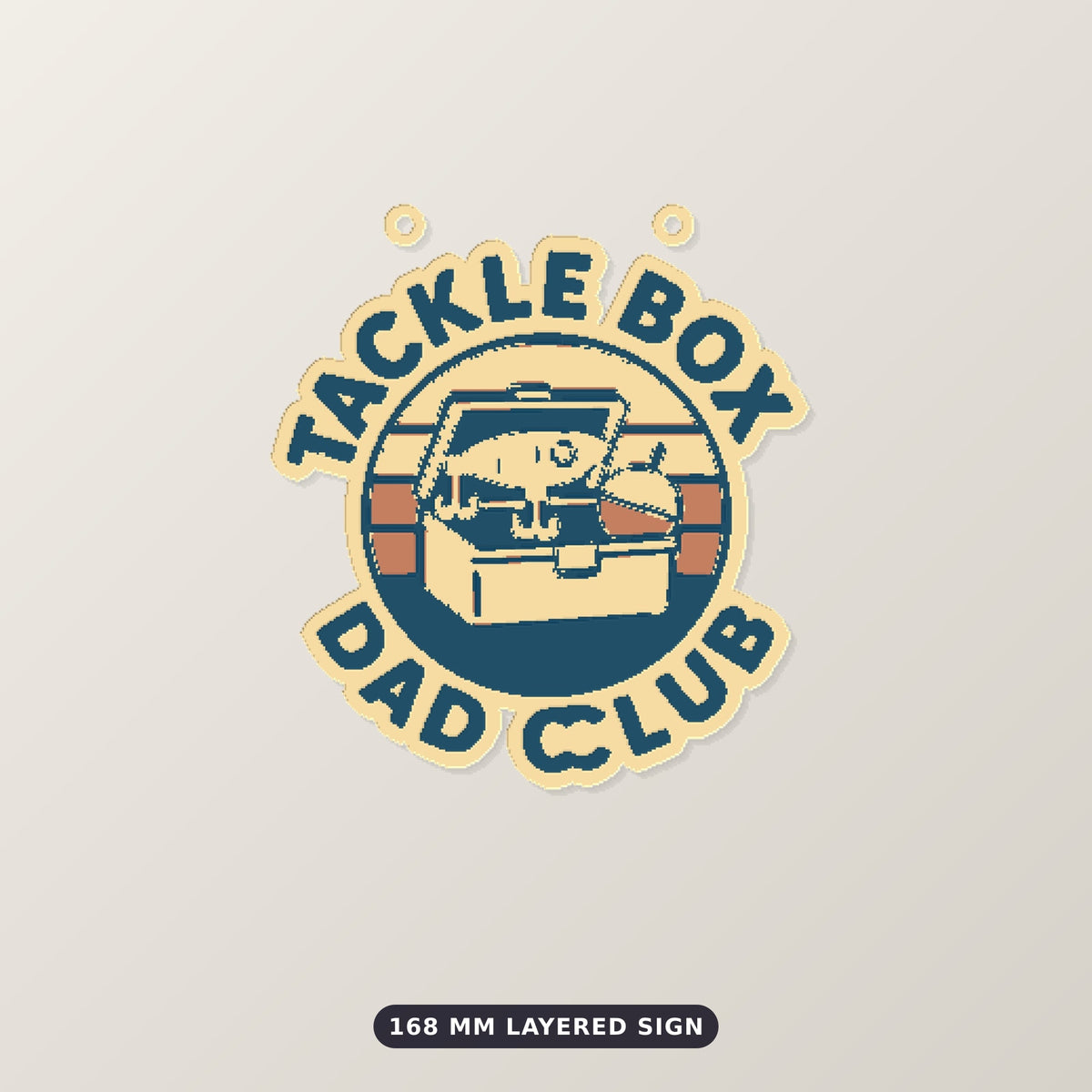 Round retro ornament showing an open tackle box on a striped sunset circle with the words Tackle Box Dad Club around the edge, hanging against a dark green background with golden bokeh lights.