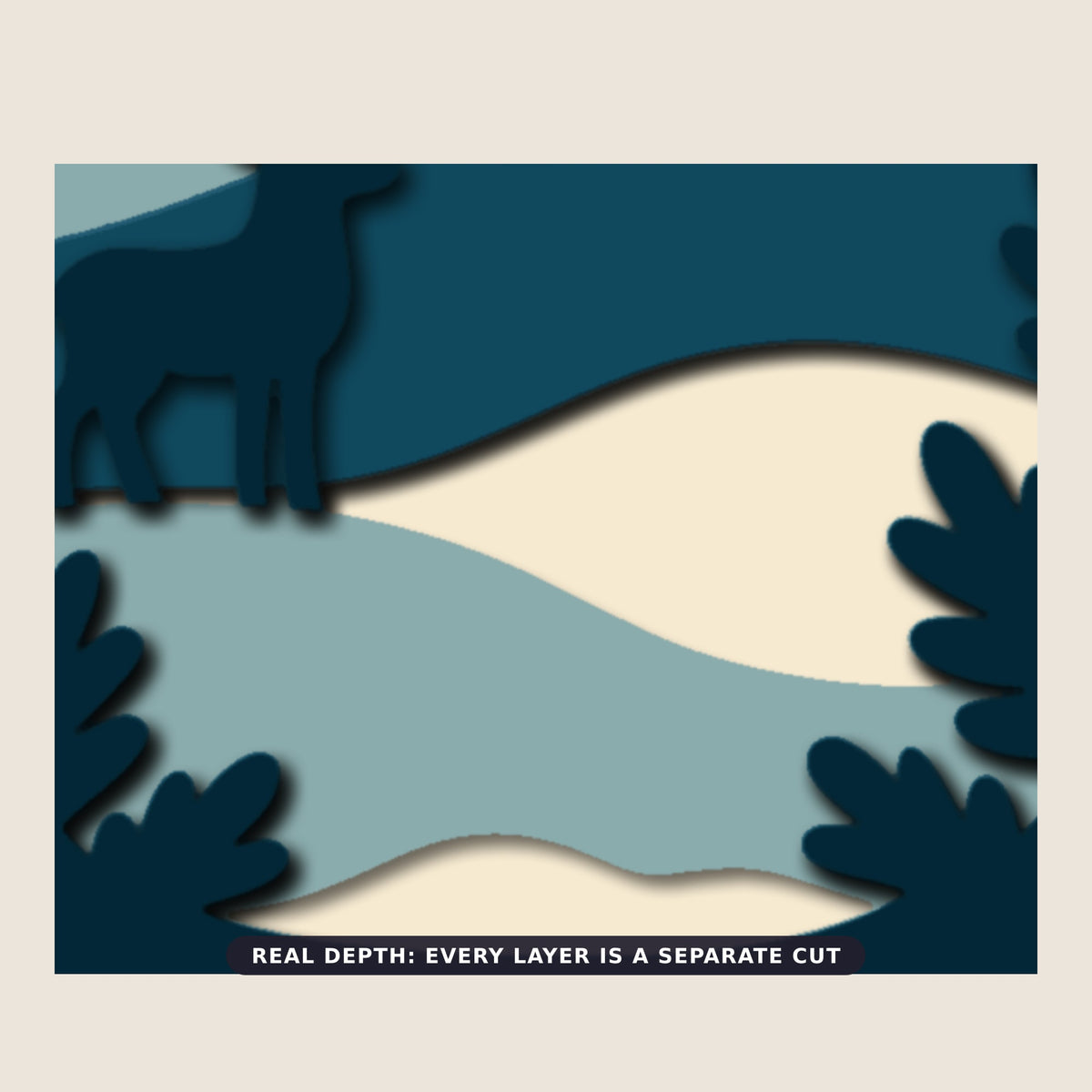 Layered papercut shadow box in deep blues and cream showing a stag standing on a snowy hill in front of a cabin, pine trees, a moon and a star at night.